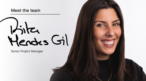 Smiling woman with straight dark hair wearing a black top, positioned on the right side of the image. On the left, text reads "Meet the team" above a handwritten name "Rita Mendes Gil" and the title "Senior Project Manager" on a light background.